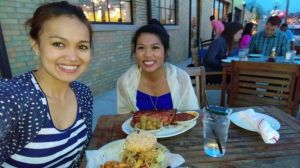 my cousin and I enjoying North Carolina BBQ